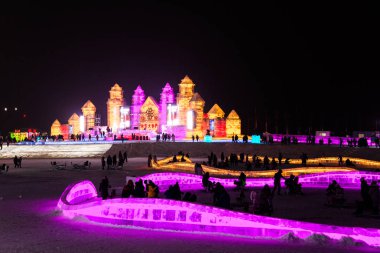 HARBIN, CHINA - JAN 21, 2017: Harbin International Ice and Snow Sculpture Festival is an annual winter festival that takes place in Harbin. It is the world largest ice and snow festival. clipart
