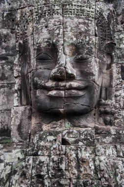 Prasat taş yüzleri gülümseyen Bayon Orta Tapınağı, Angkor Thom, Siem Reap, Kamboçya karmaşıktır. Antik Khmer mimarisi ve ünlü Kamboçyalı dönüm noktası, dünya mirası.