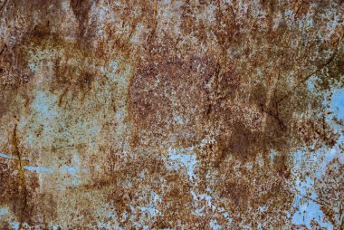 Mavi boyanmış metal duvardaki pas grunge desen arka plan yakın plan