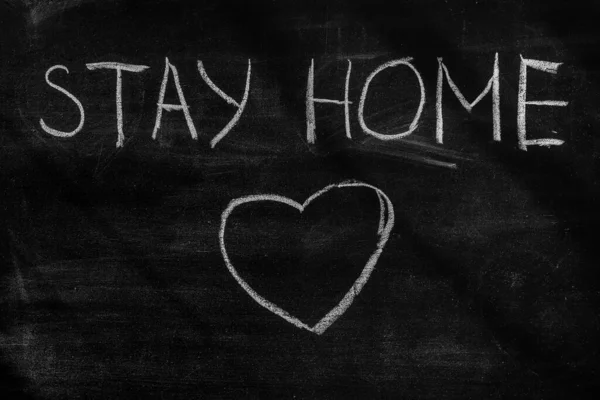 Coronavirus pandemic behaviour rules or health advice - stay at home. Stay at Home. Stay at Home chalkboard inscription. — Stock Photo, Image