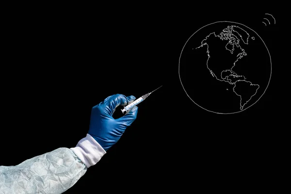 Το δυτικό ημισφαίριο της γης τρέμει, ένα άτομο με ιατρικά γάντια κρατάει μια σύριγγα. Μαύρο φόντο — Φωτογραφία Αρχείου