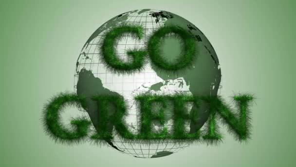 4Kの緑のコンセプトを行く 風の中で動く草で作られた緑の文字でテキスト 背景に地球を回転 3Dレンダリング — ストック動画
