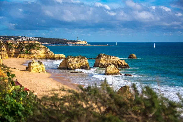 Famous rock formations in the ocean on Praia da Rocha, Portimao, Portugal