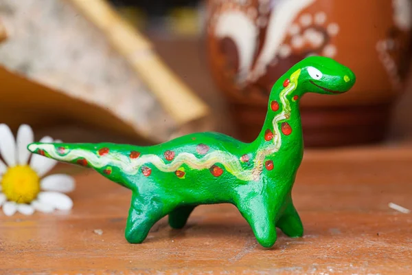 Clay ceramic toy dinosaur still life beautiful cute kids long neck — Stock Photo, Image