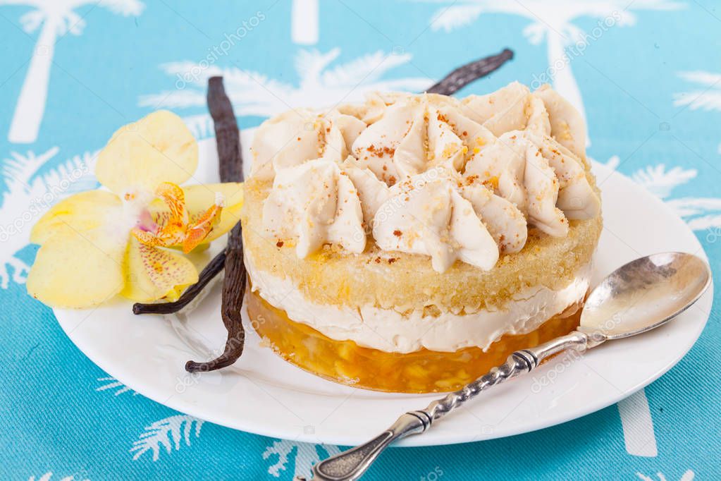cake with vanilla, dessert, sticks, flower, orchid, on a plate close-up, cream layers