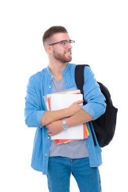Beyaz arka plan üzerinde izole kitap tutan bir okul çantası olan bir erkek öğrenci
