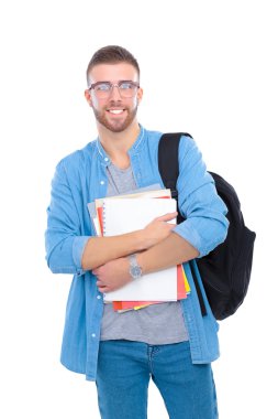 Beyaz arka plan üzerinde izole kitap tutan bir okul çantası olan bir erkek öğrenci