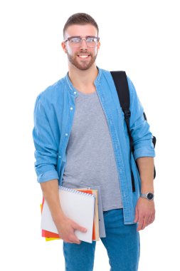 Beyaz arka plan üzerinde izole kitap tutan bir okul çantası olan bir erkek öğrenci