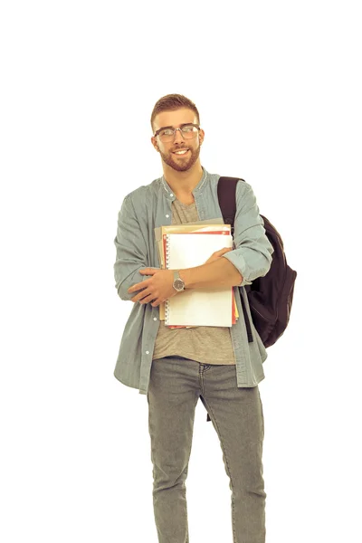 Egy férfi hallgató-val egy iskola táska gazdaság könyvek elszigetelt fehér background — Stock Fotó