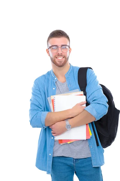 Uno studente maschio con una borsa della scuola che tiene libri isolati su sfondo bianco — Foto Stock