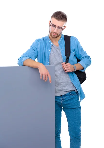 Portrait of a smiling male student holding blank board — Stock Photo, Image