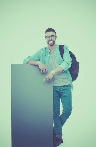 Porträtt av en leende manlig student håller Tom styrelsen — Stockfoto