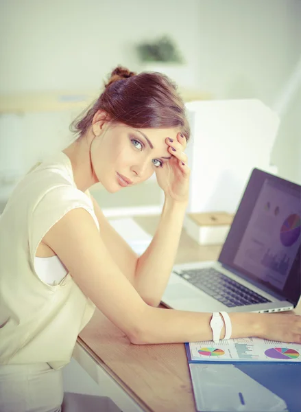 Young and beautiful businesswoman tired from work in the office — Stock Photo, Image