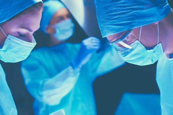 Týmový chirurg na operačním sále — Stock fotografie