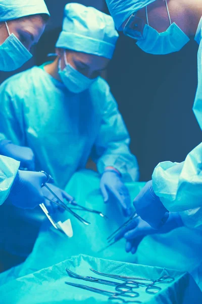 Team surgeon at work in operating room — Stock Photo, Image