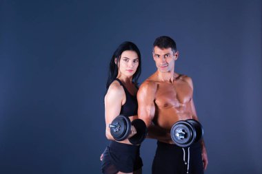 Dambılı atletik erkek ve kadın