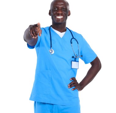 Sen beyaz arka plan üzerinde izole, yakışıklı genç doktor işaret parmağı