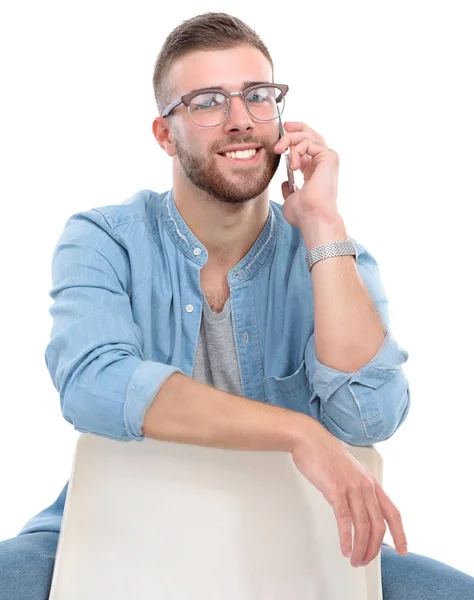 Hombre joven de pie con bolso aislado sobre fondo blanco — Foto de Stock