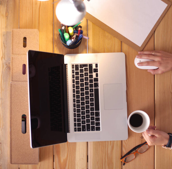 Young female working sitting at a desk