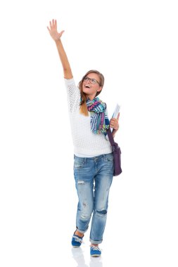 Egzersiz kitap tutan bir genç öğrenci kadın portresi.