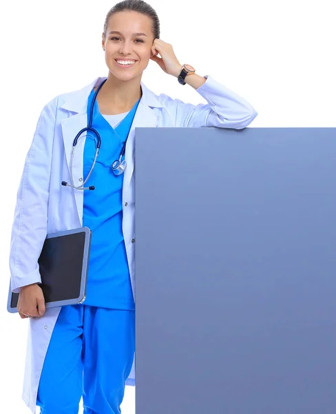 A female doctor with a blank billboard. — Stock Photo, Image