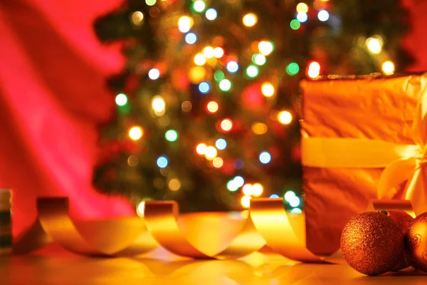 Gift boxes with balls on a christmas background — Stock Photo, Image