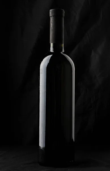 Wine bottle silhouette isolated on black background — Stock Photo, Image