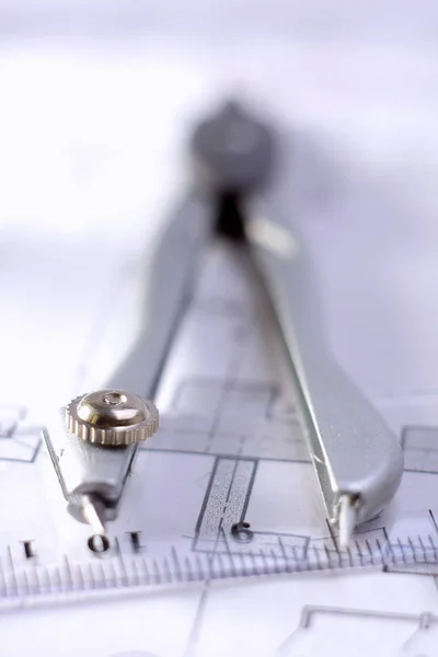 Architectural plans, compass and ruler on the desk — Stock Photo, Image