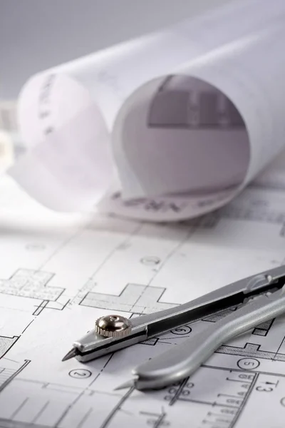 Architectural plans, compass and ruler on the desk — Stock Photo, Image