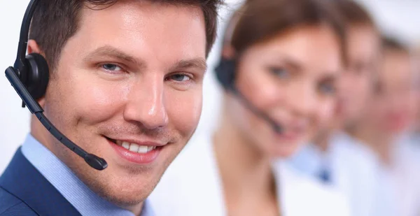 Attractive Smiling positive young businesspeople and colleagues in a call center office — Stock Photo, Image