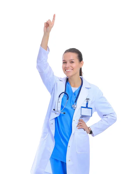Retrato de uma médica apontando isolado no fundo branco — Fotografia de Stock