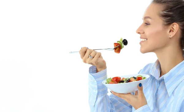 Una hermosa chica comiendo comida saludable — Foto de Stock