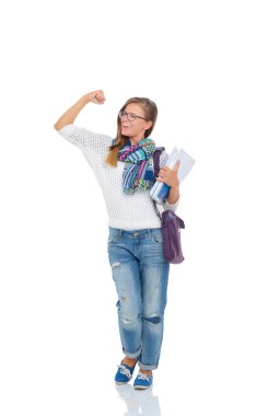 Egzersiz kitap tutan bir genç öğrenci kadın portresi.