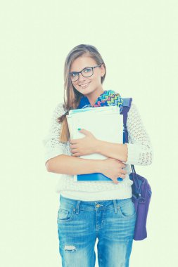 Egzersiz kitap tutan bir genç öğrenci kadın portresi.