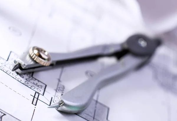 Architectural plans, compass and ruler on the desk — Stock Photo, Image