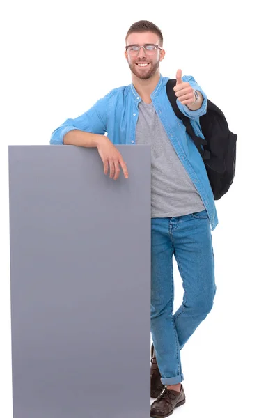 Retrato de un estudiante sonriente sosteniendo tablero en blanco — Foto de Stock