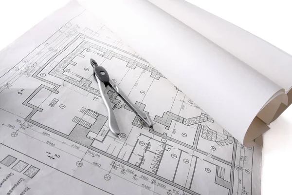 Архитектурные планы, компас и линейка на столе — стоковое фото