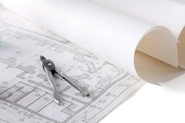 Architectural plans, compass and ruler on the desk — Stock Photo, Image