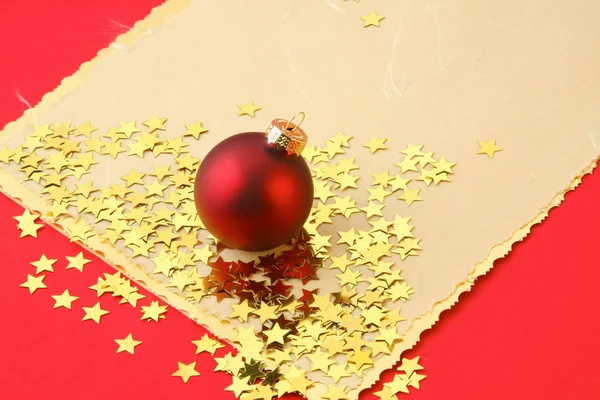 Christmas card with red balls and gold stars — Stock Photo, Image
