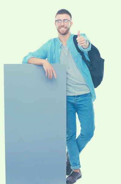 Retrato de um estudante do sexo masculino sorridente segurando placa em branco — Fotografia de Stock