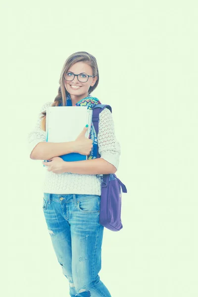Porträt einer jungen Studentin mit Schulheften. — Stockfoto