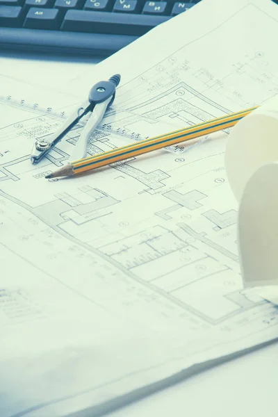 Architectural plans, compass and ruler on the desk — Stock Photo, Image