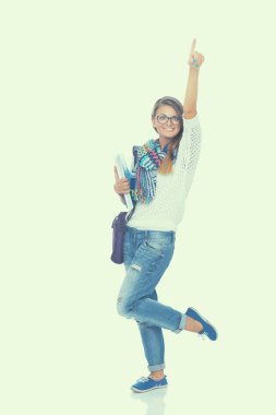 Egzersiz kitap tutan bir genç öğrenci kadın portresi.