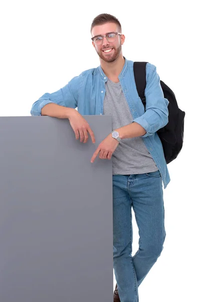 Retrato de um estudante do sexo masculino sorridente segurando placa em branco — Fotografia de Stock