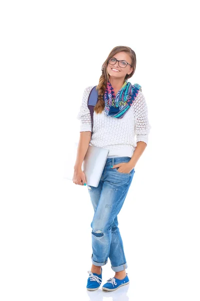 Adolescente sonriente con portátil sobre fondo blanco — Foto de Stock