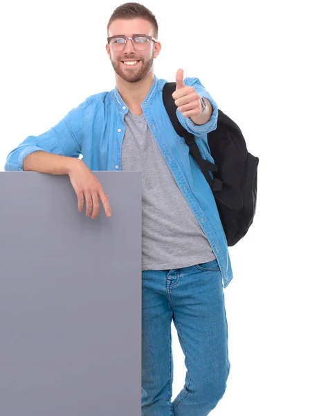 Retrato de un estudiante sonriente sosteniendo tablero en blanco —  Fotos de Stock