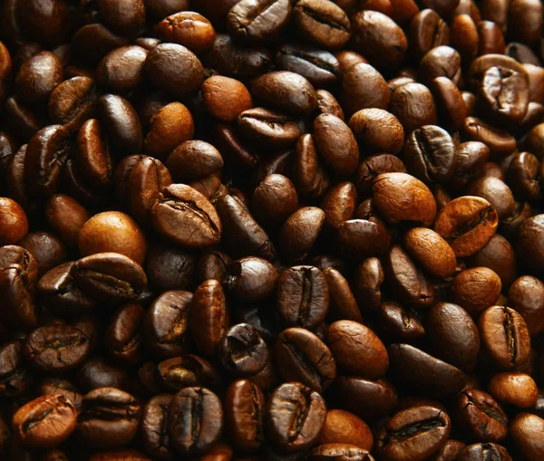 Roasted coffee beans, can be used as a background — Stock Photo, Image