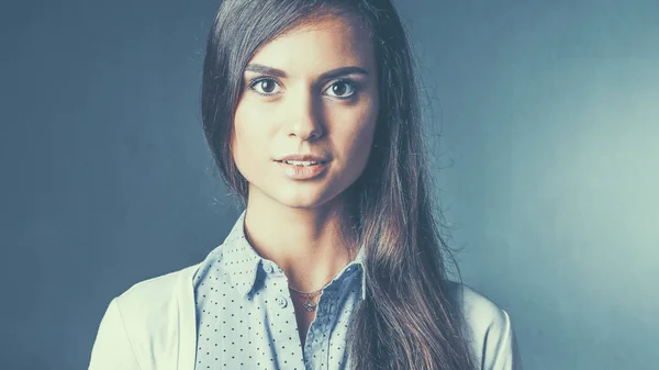 Portrait of a businesswoman , against dark background — Stock Photo, Image