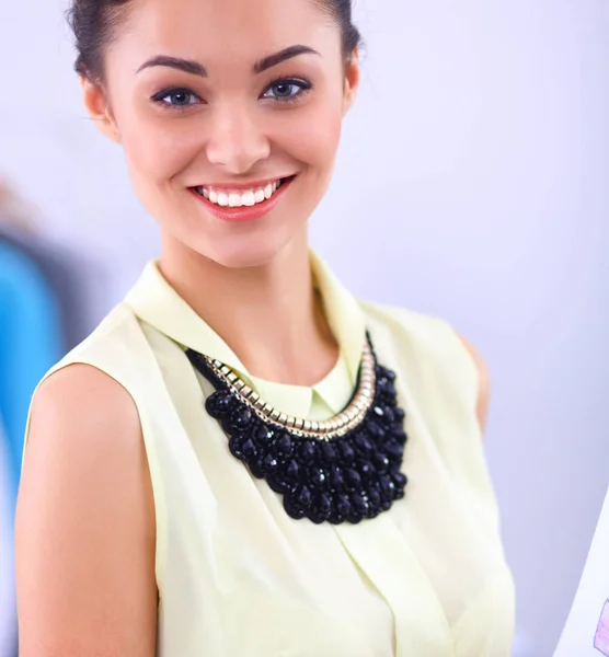 Modern young fashion designer working at studio. — Stock Photo, Image