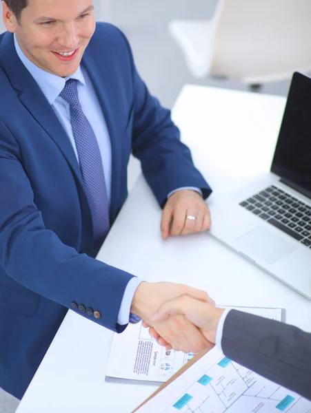 Business people shaking hands, finishing up a meeting, in office — Stock Photo, Image